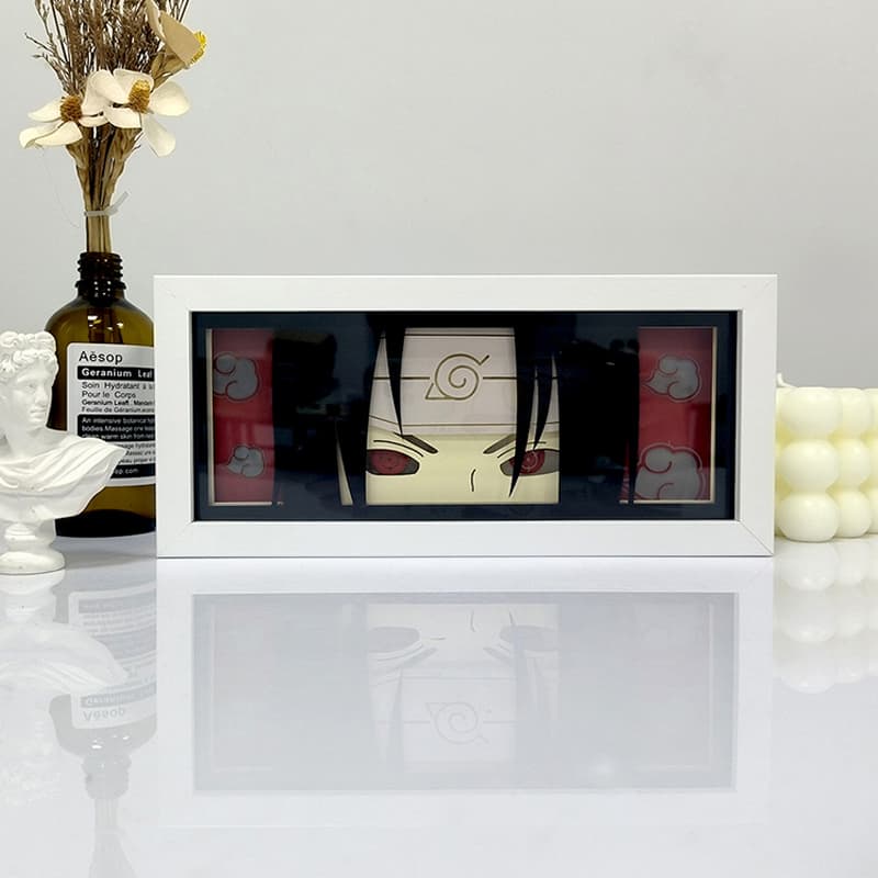 Naruto Itachi Tsukuyomi anime light box by MyAnimeLightbox, display off, in white frame with decorative background