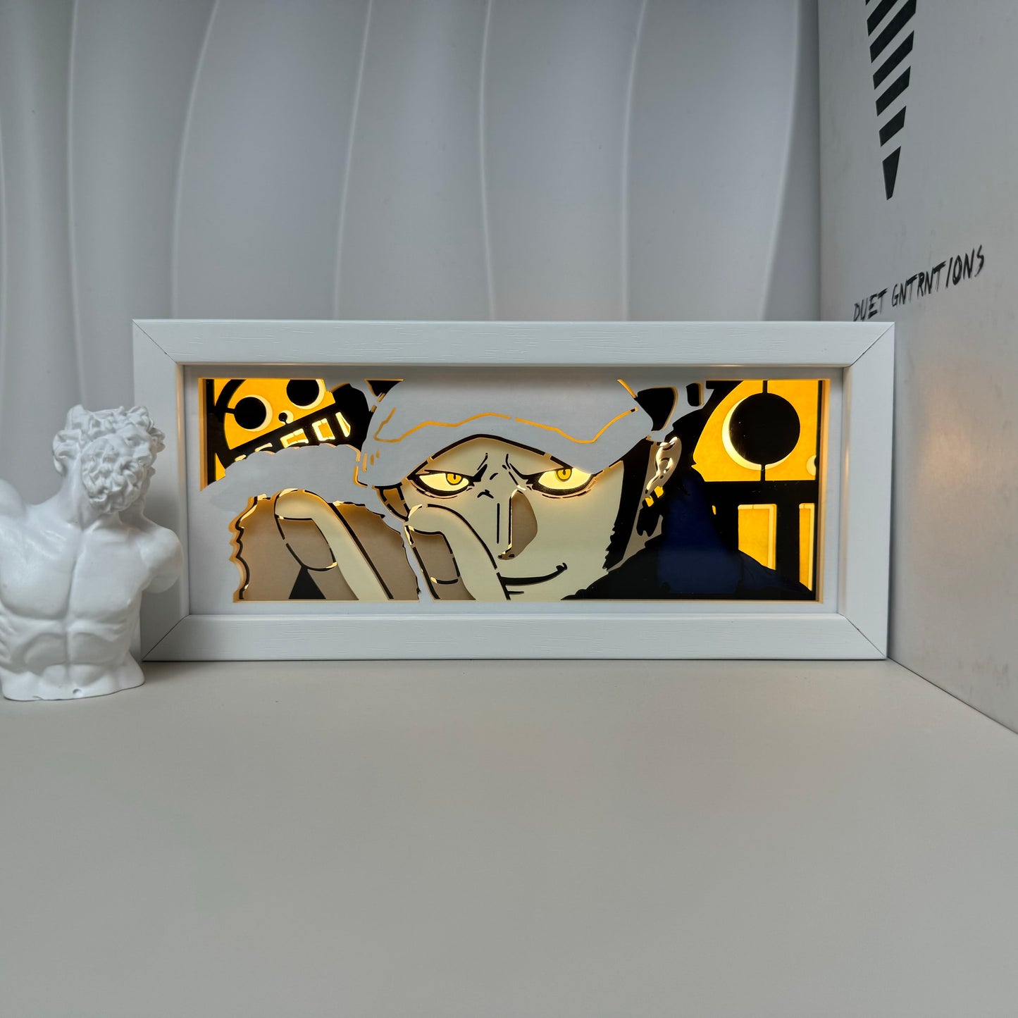 One Piece Trafalgar D. Water Law anime light box by MyAnimeLightbox, turned on with ambient room light