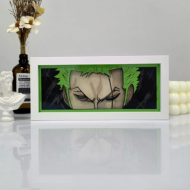 One Piece Zoro anime light box by MyAnimeLightbox, display off, in white frame with decorative background