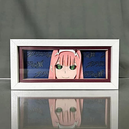 Darling in the Franxx Zero Zero Two Smile Anime Light Box by Myanimelightbox, dipaparkan, dalam bingkai putih dengan latar belakang hiasan
