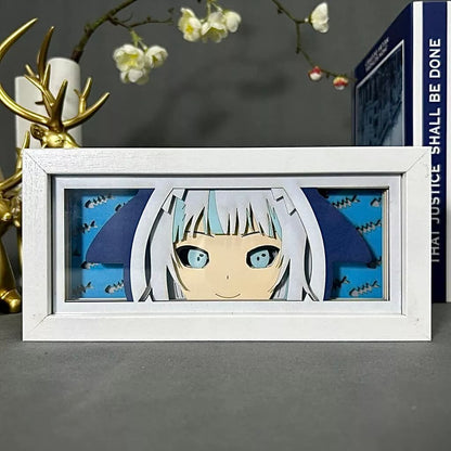 Gawr Gura Anime Light Box oleh Myanimelightbox, dipaparkan, dalam bingkai putih dengan latar belakang hiasan