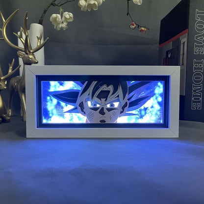 Goku Blue Light Anime Light Box od Myanimelightbox, zapnutý s lehkým okolním pokojem