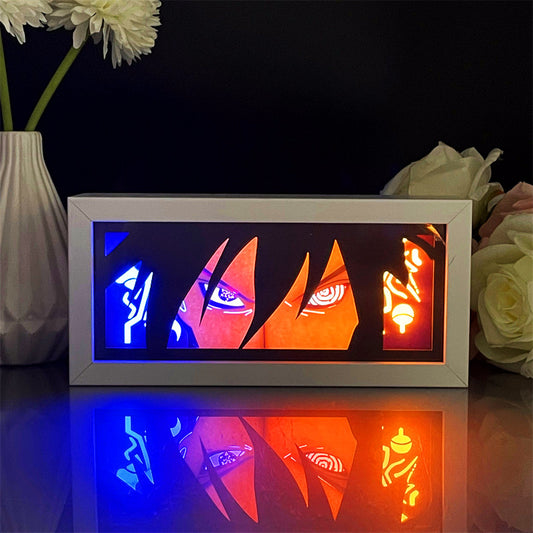 Sasuke Uchiha Rinnegan Light Box Special Edition featuring detailed artwork illuminated by vibrant LED lighting, perfect for Naruto room decor and fans of Sasuke Uchiha | My Anime Light Box 

