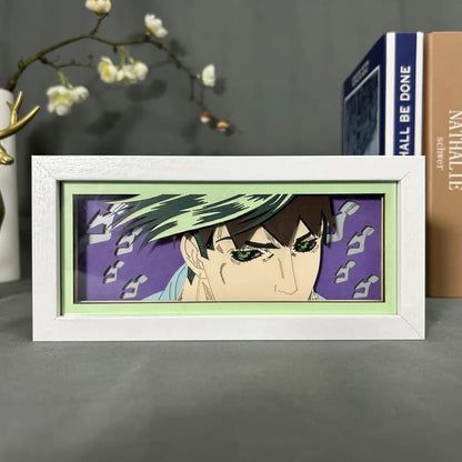 Kotak cahaya anime pelik Jojo&#39;s Bizarre Rohan oleh Myanimelightbox, dipaparkan, dengan bingkai putih dengan latar belakang hiasan
