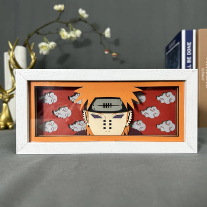Naruto Pain Anime Light Box od Myanimelightbox, displej, v bílém rámu s ozdobným pozadím