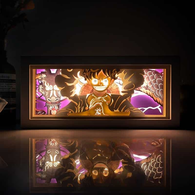 Caja de luz de anime luffy de una pieza iluminada en la habitación oscura, efecto brillante de myanimelightbox
