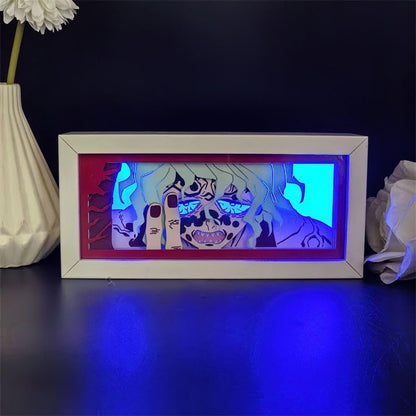 Kotak cahaya anime Gyutaro menyala dalam warna biru yang menakutkan, yang menampilkan mata ikonnya yang ikonik.