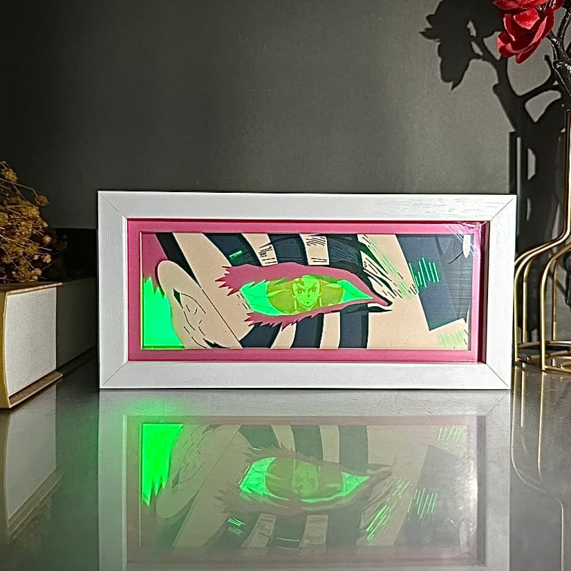 RGB-Leuchtkasten mit Demon Slayer Tengen Uzui, der in grünem Licht erstrahlt

