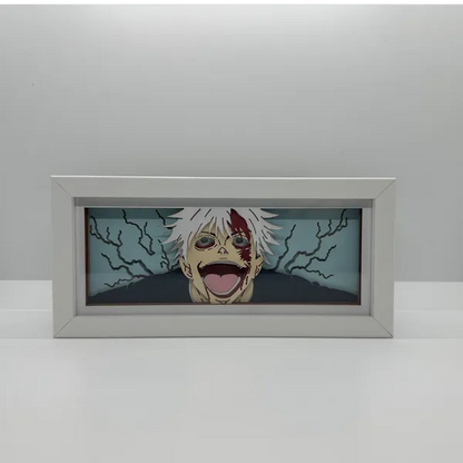 Obras de arte emolduradas de um personagem animado Gojo com uma moldura branca em um fundo cinza