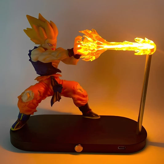 Super Saiyan Goku figure firing a glowing flame blast on an LED display stand.
