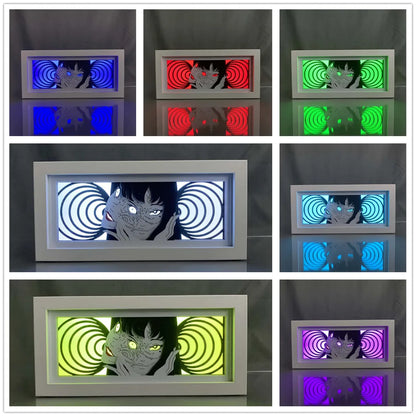 Kotak cahaya koleksi anime tomie bersinar dalam pelbagai warna dalam persediaan gelap

