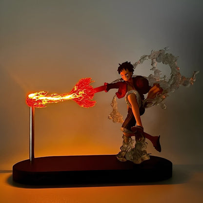 Luffy LED flame punch figure on display base with glowing fire effect
