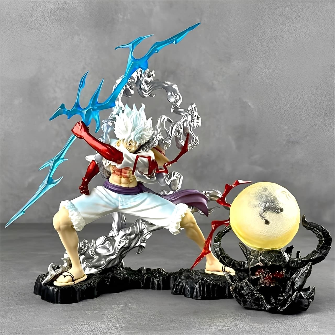 Anime PVC Nika Luffy Gear 5 figure with lightning spear and dynamic cloud energy.
