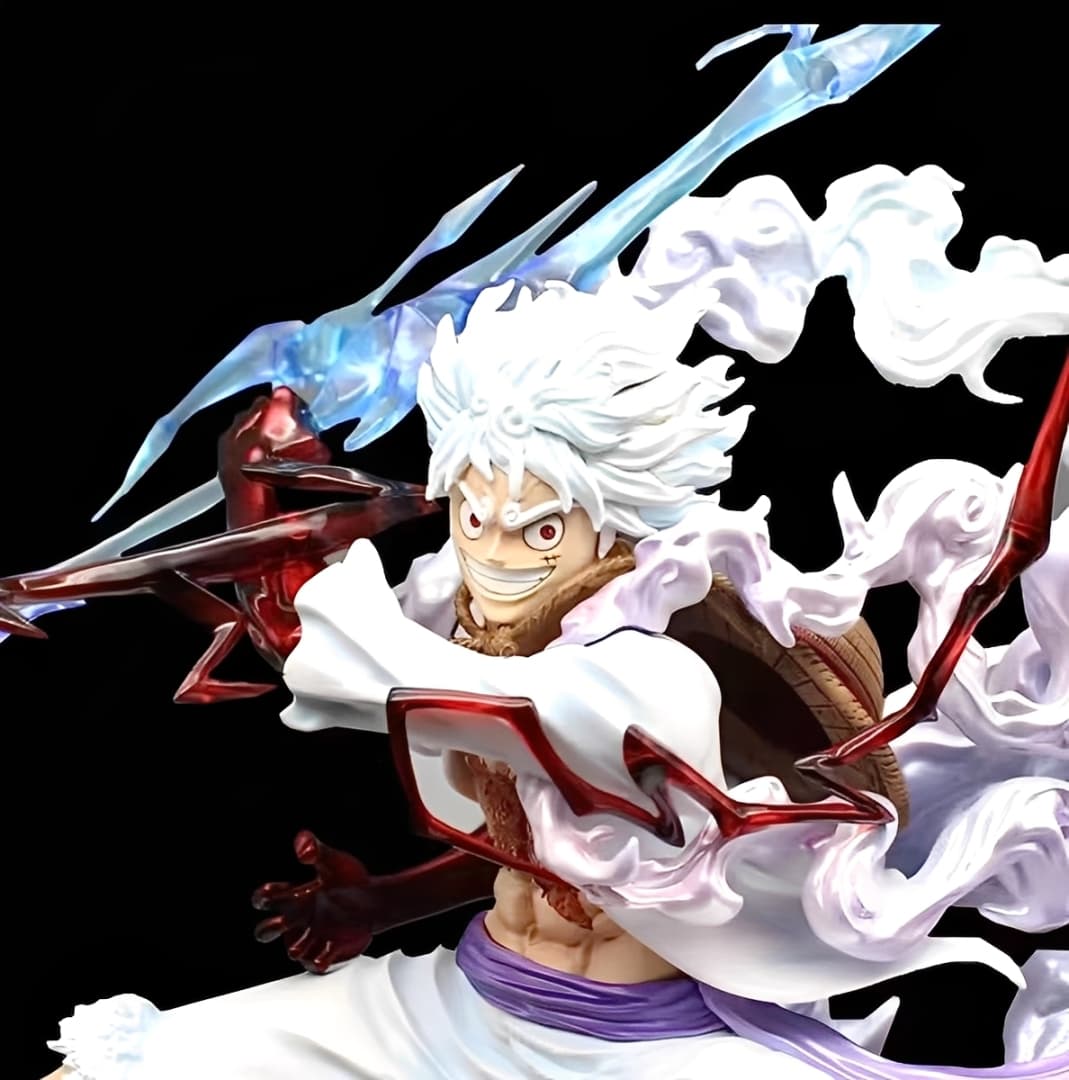 Close-up of Nika Luffy Gear 5 figure showing detailed face, white hair, and red haki arm effects.