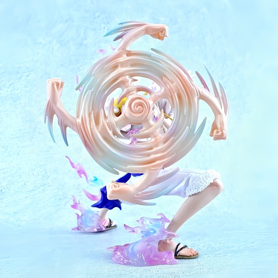 Rear angle of Gear 5 Nika Luffy figure showcasing energy swirl design.