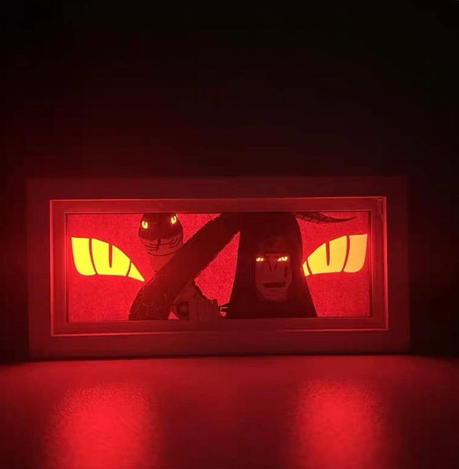 Punainen LED-Lit Anime Light -laatikko, joka näyttää Orochimarun Narutosta voimakkaiden hehkuvien silmien kanssa