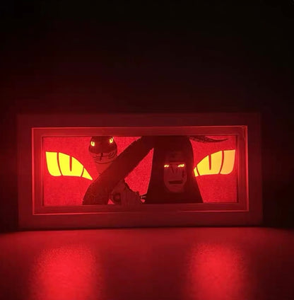 Boîte lumineuse d&#39;anime à LED rouge montrant Orochimaru de Naruto avec des yeux brillants intenses